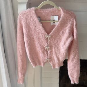 Pink Fuzzy Sweater with Bow Accents